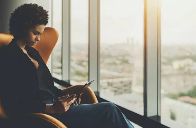 Woman reading iPad