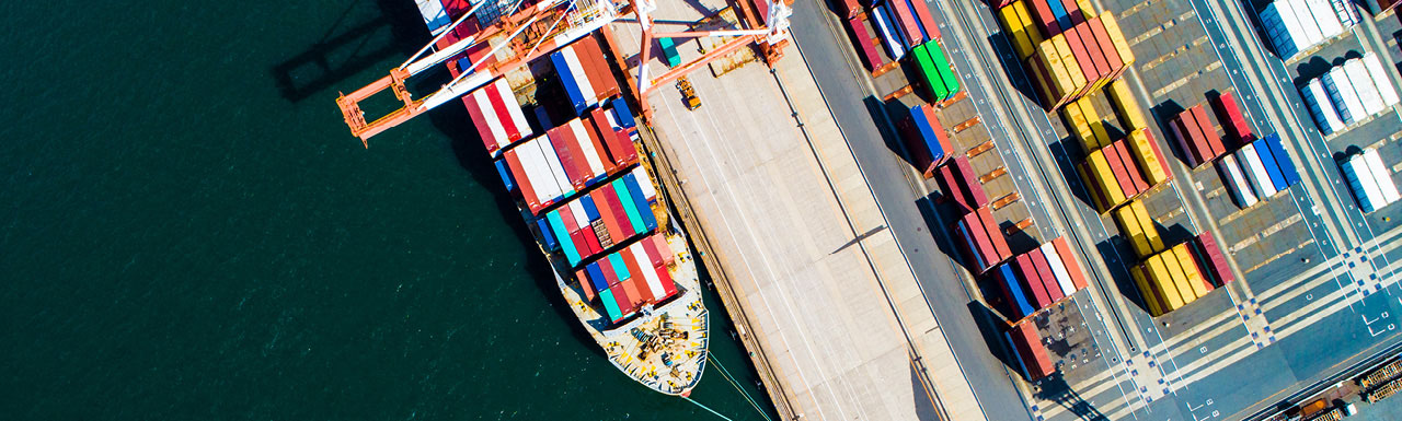 Ships on the dockyard with one ship outside the dockyard Ships on the dockyard with one ship outside the dockyard