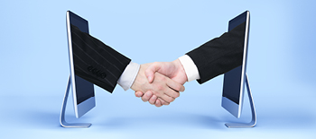 Two hands shaking via electronic tablets Two hands shaking via electronic tablets