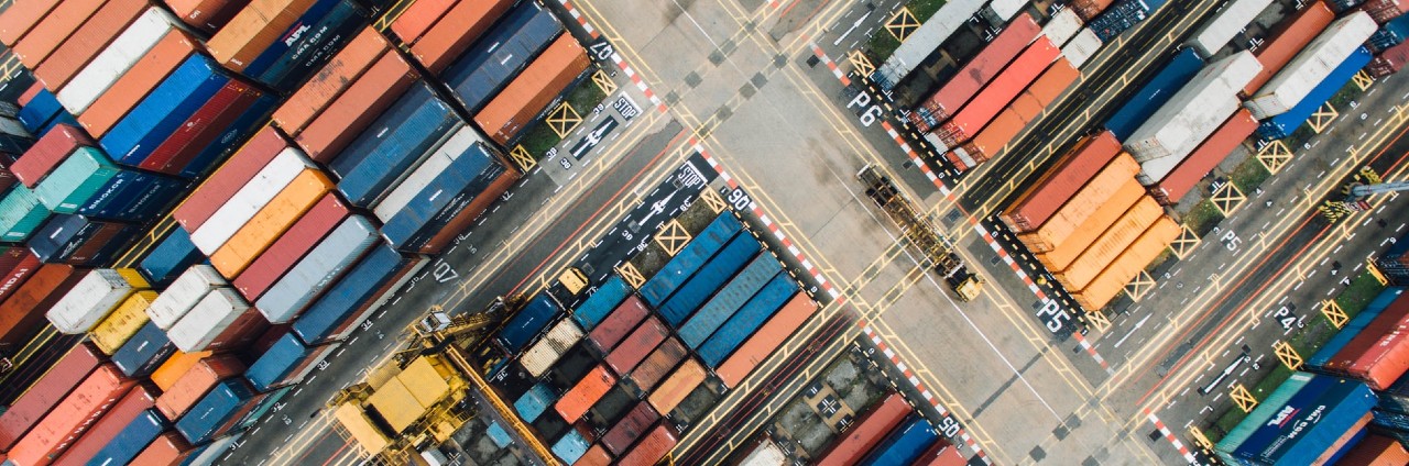 Cargo ships parked in dockyard