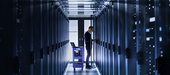 Data servers and a person working on them