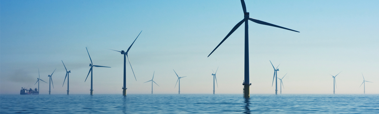 Windmills installed on a sea and ocean Windmills installed on a sea and ocean