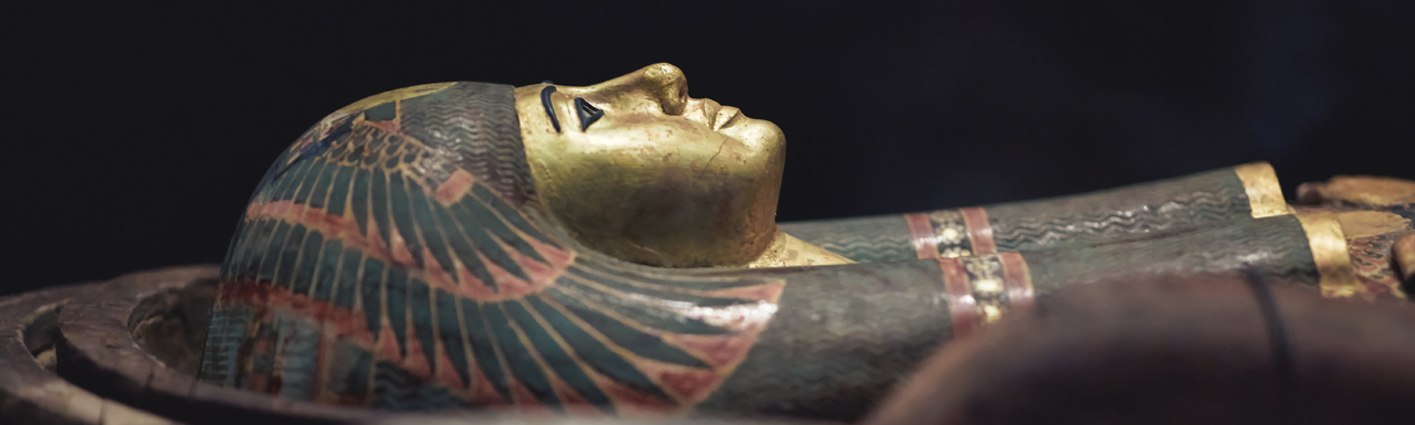 An Egyptian statue lying in the dark An Egyptian statue lying in the dark