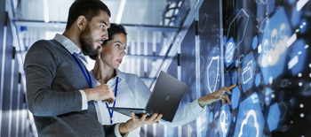 Cyber Man Woman Pointing at Digital Screen Technology Cyber Man Woman Pointing at Digital Screen Technology