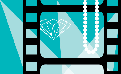 A film roll with a pearl necklace and a diamond graphic